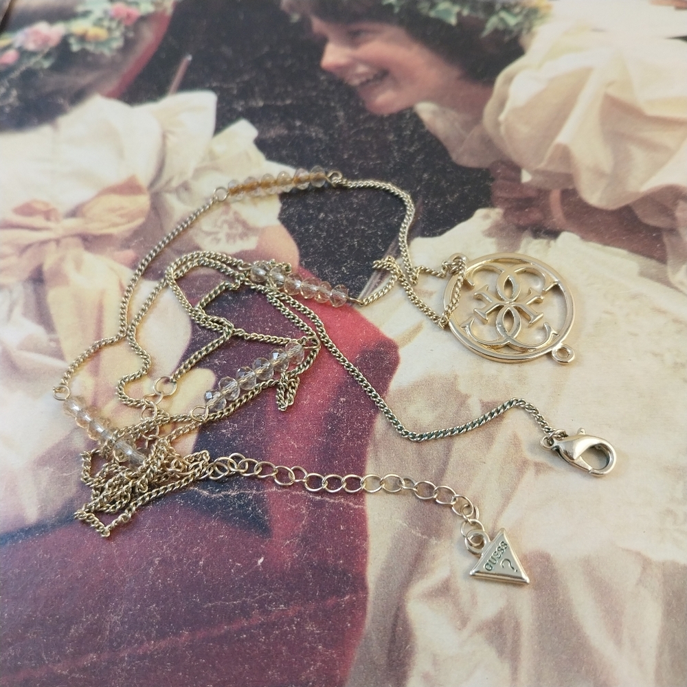 Guess Gold and Crystal Pendant Necklace - Picture 11 of 13